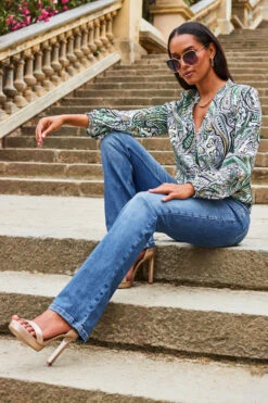 Mid Blue Mid Rise Bootcut Jeans