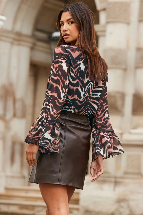 Natural Abstract Animal Print Flared Cuff Top - Image 5